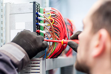 Electrician working on wires